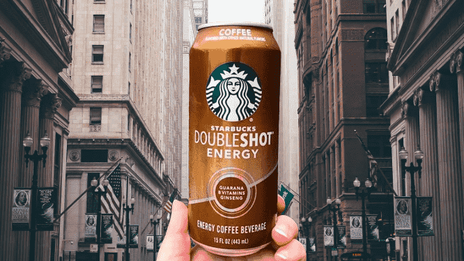 Man holding a can of Starbucks double shot energy drink